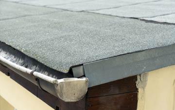 repair or replace Ffynnon Ddrain flat roofing?